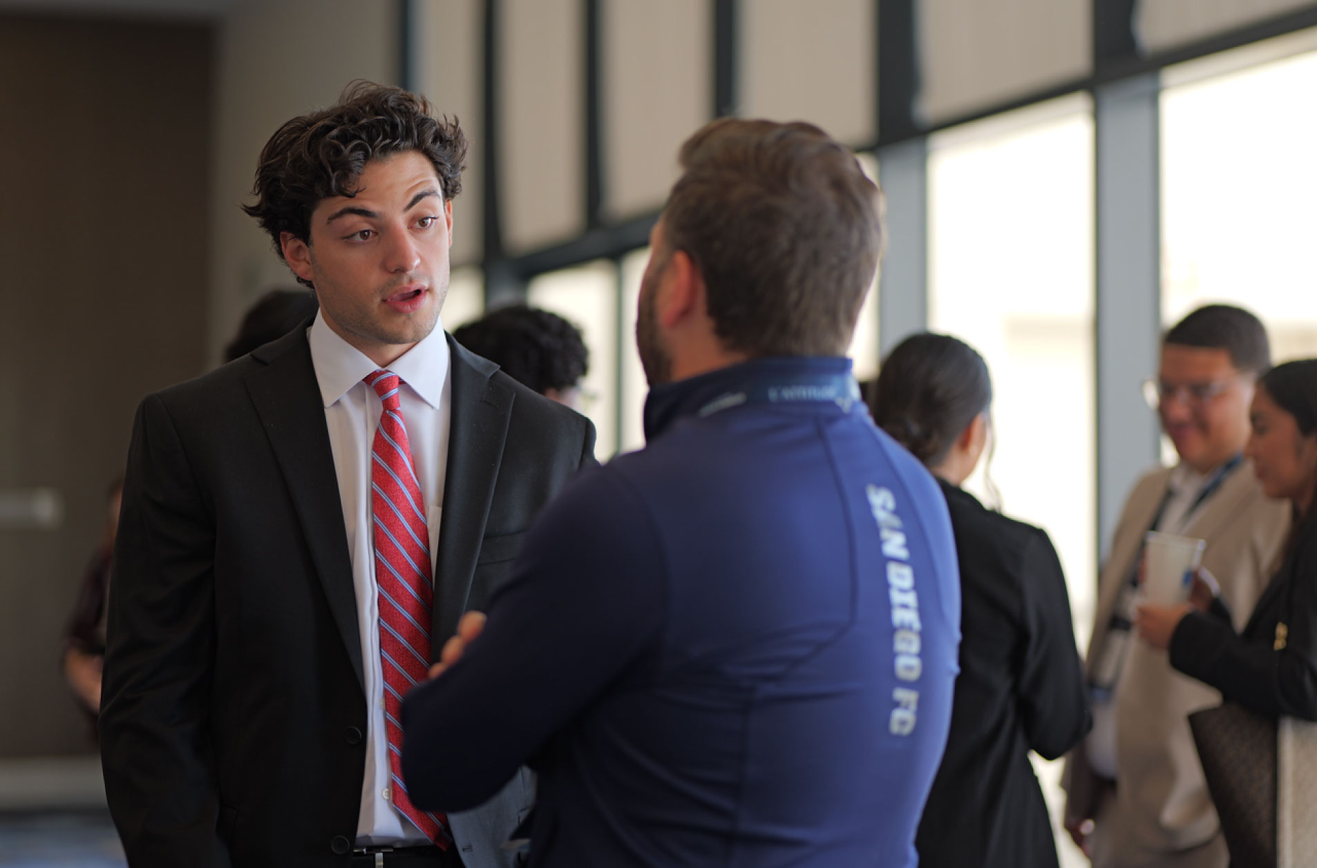 People networking at AVANCE event
